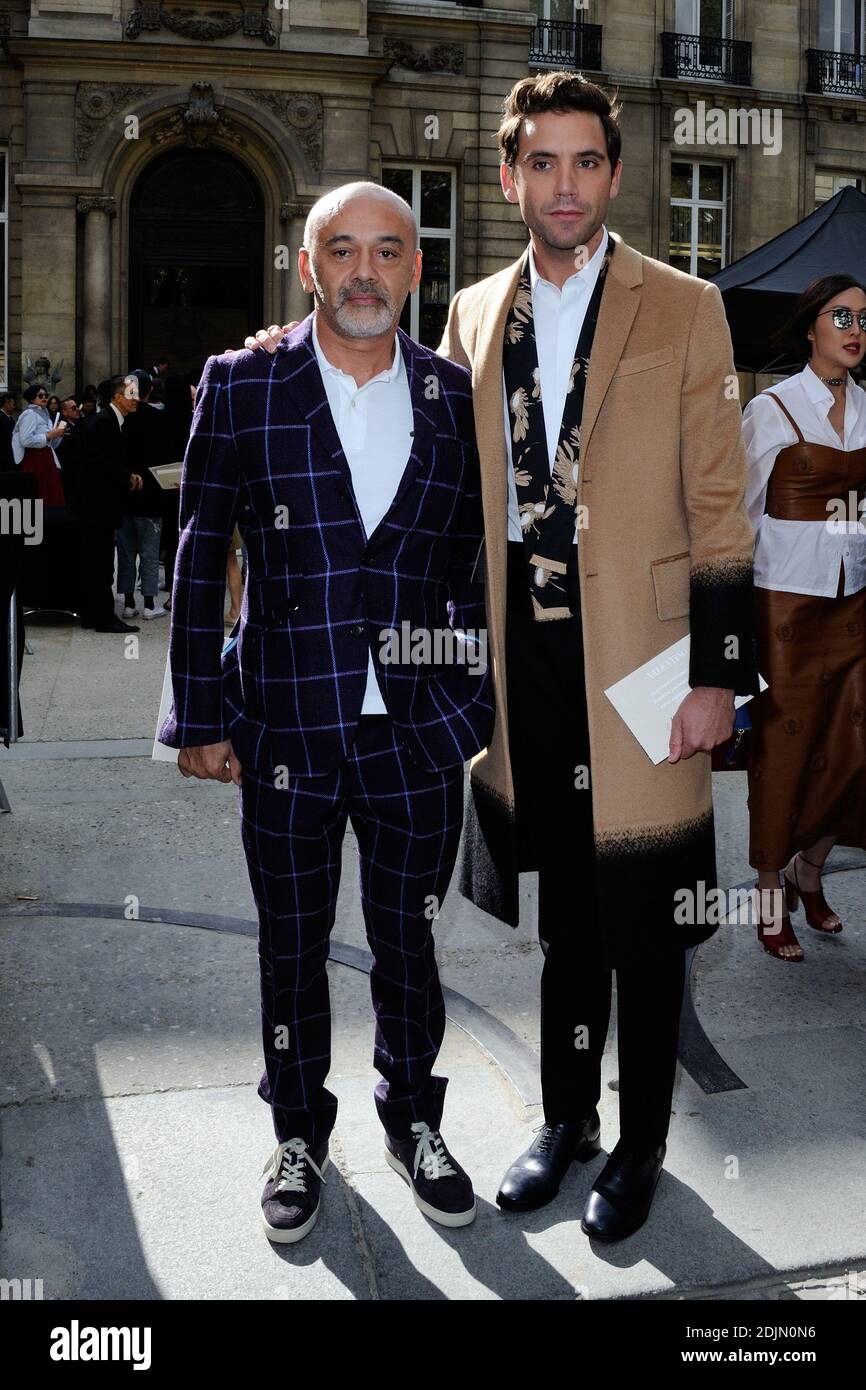 Christian Louboutin and Mika arriving at the Valentino show as a