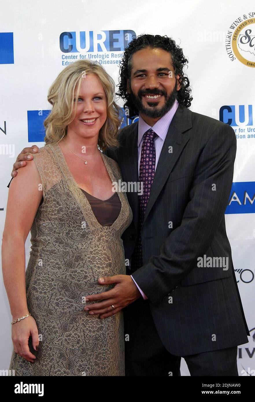 John Ortiz and wife arrive at the Lincoln Theater for the Miami Vice East Coast Premiere. Miami Beach, FL 7/25/06 Stock Photo