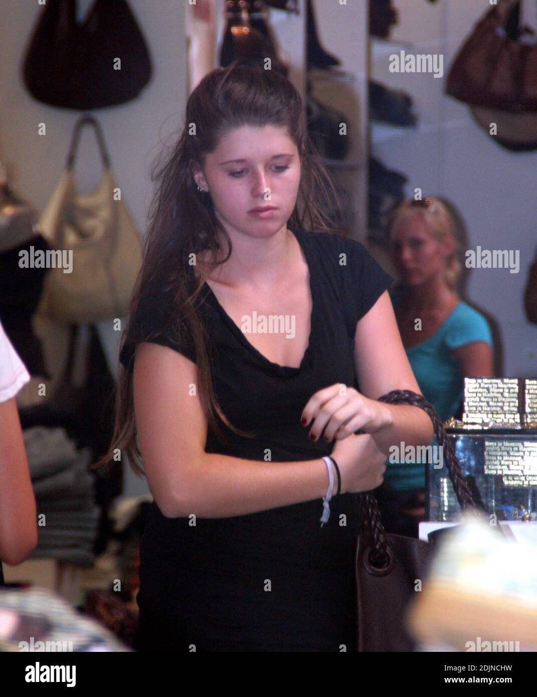 Maria Shriver and her daughter Katherine enjoy a girl's shopping spree in Beverly Hills, Ca. The pair shopped at Kitson, Lisa Kline and Madison on Robertson Blvd whilst two security stood guard. 7/27/06 Stock Photo