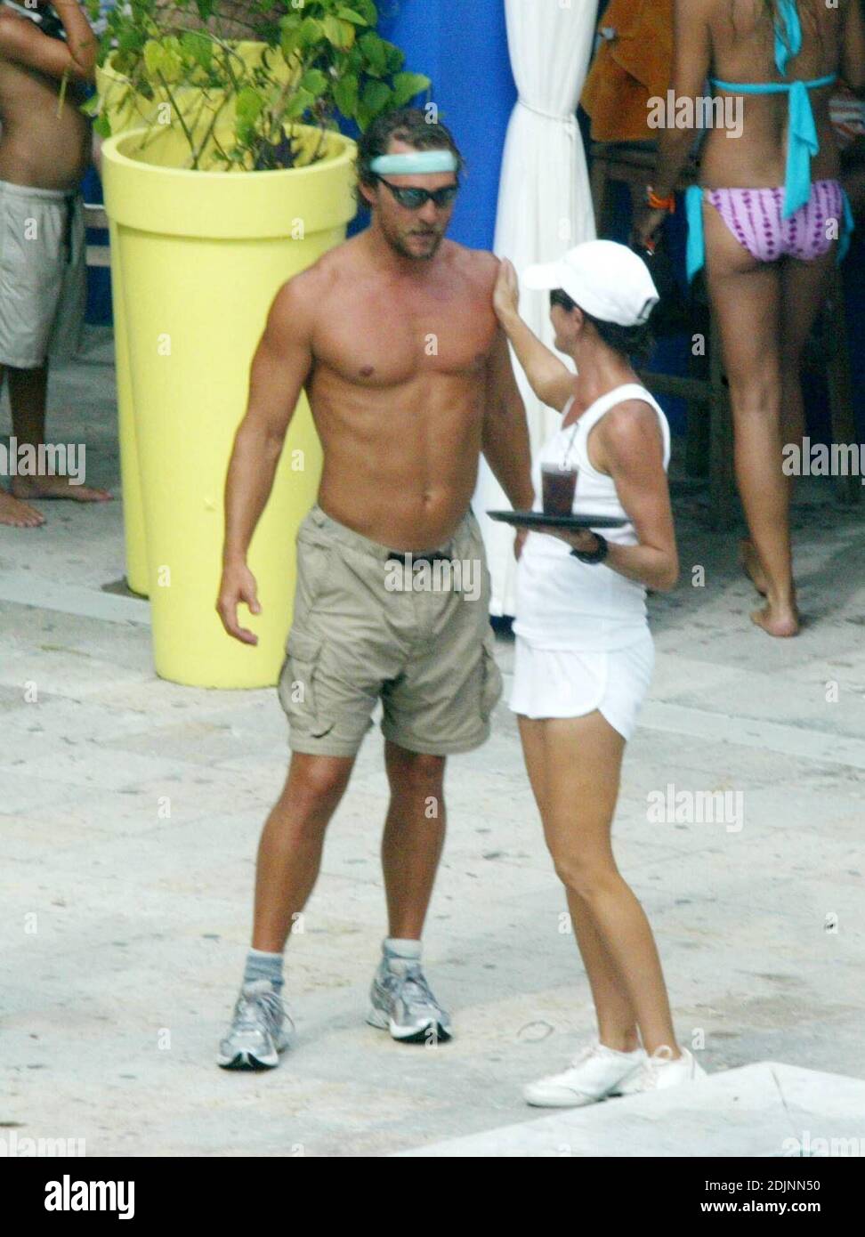 Matthew Mcconaughey And Exercise Buddy Lance Armstrong Cool Off In The Pool After Their Workout Enjoying The Company Of Bathing Beauties At A Miami Beach Hotel 8 9 06 Stock Photo Alamy