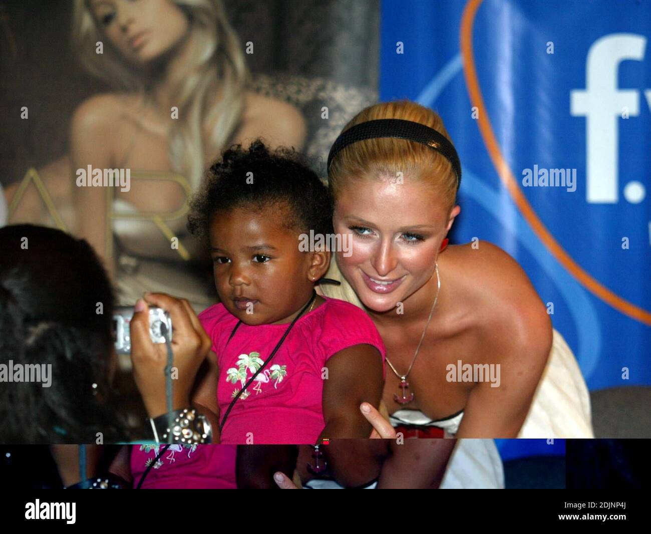 Paris Hilton appears at Spec's music store in Miami Beach, FL to sign ...