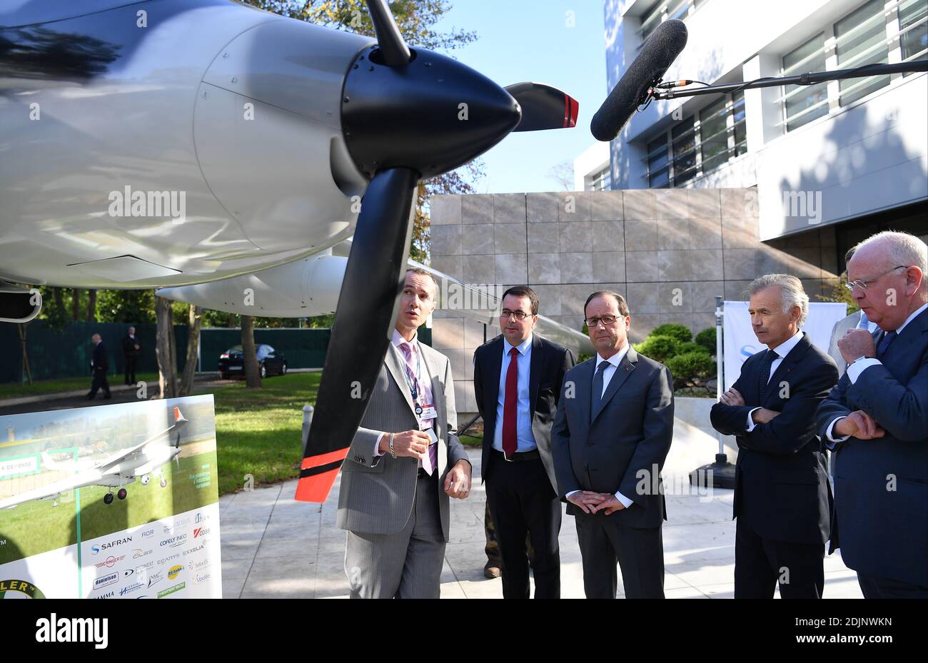 French President Francois Hollande tours the Safran showroom of the  strategic navigation center and attends the presentation of the Patroller  drone during the inauguration of the Research and Development Center Safran  Electronics