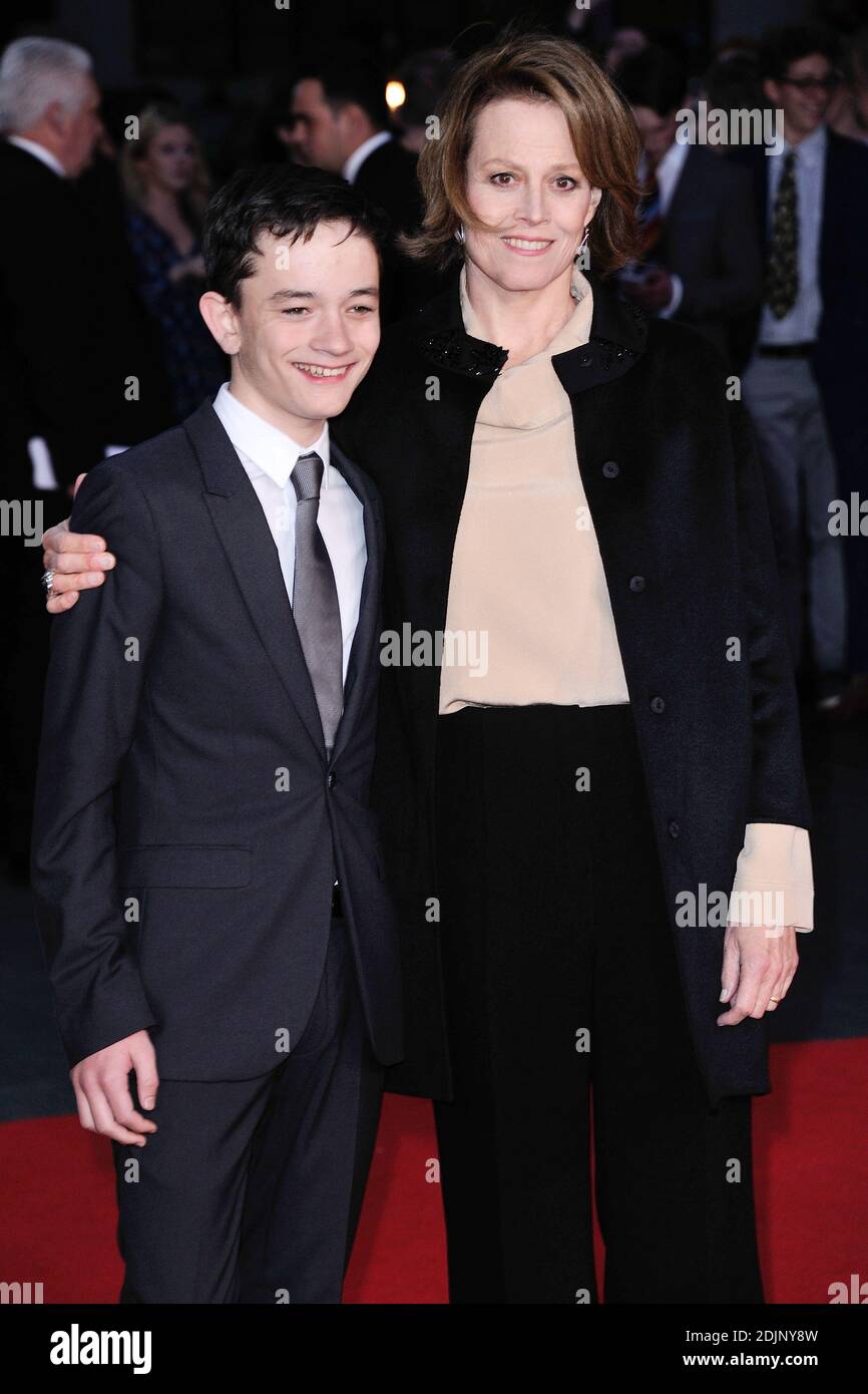 Lewis MacDougall and Sigourney Weaver attending the premiere of A ...