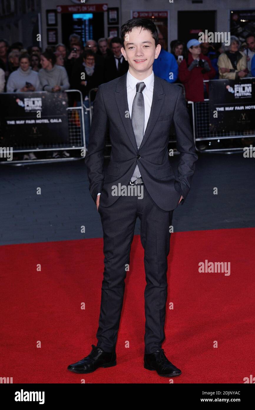 Lewis MacDougall attending the premiere of A Monster Calls as part of ...