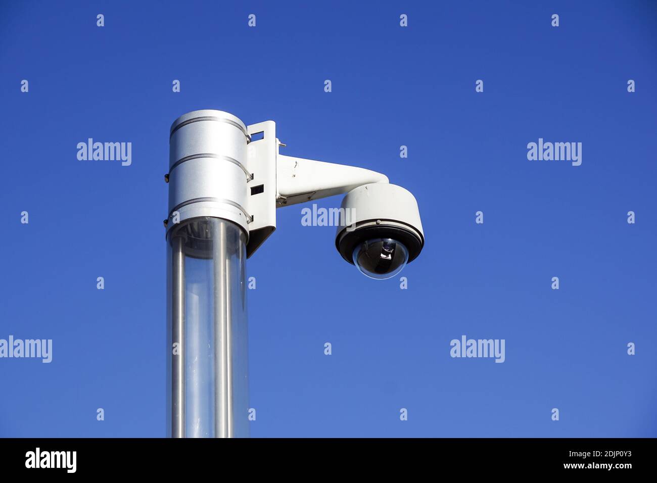 Surveillance camera on light pole hi-res stock photography and images