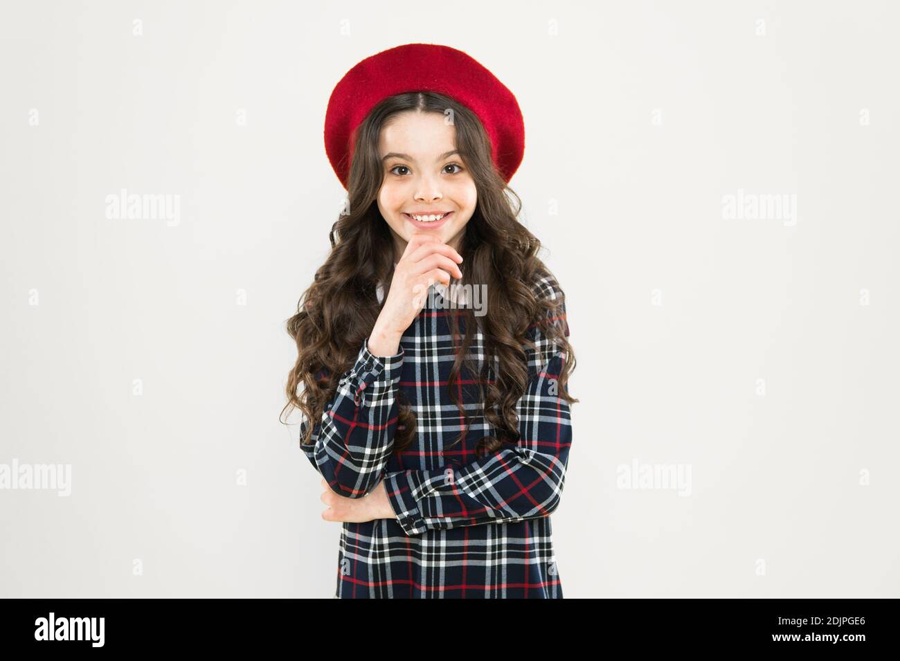 Fancy accessory. Child long curly hair wearing beret hat. Happy schoolgirl  stylish uniform. Happy childhood concept. Happy smiling cheerful kid  portrait. Small girl nice hairstyle. Fashion shop Stock Photo - Alamy