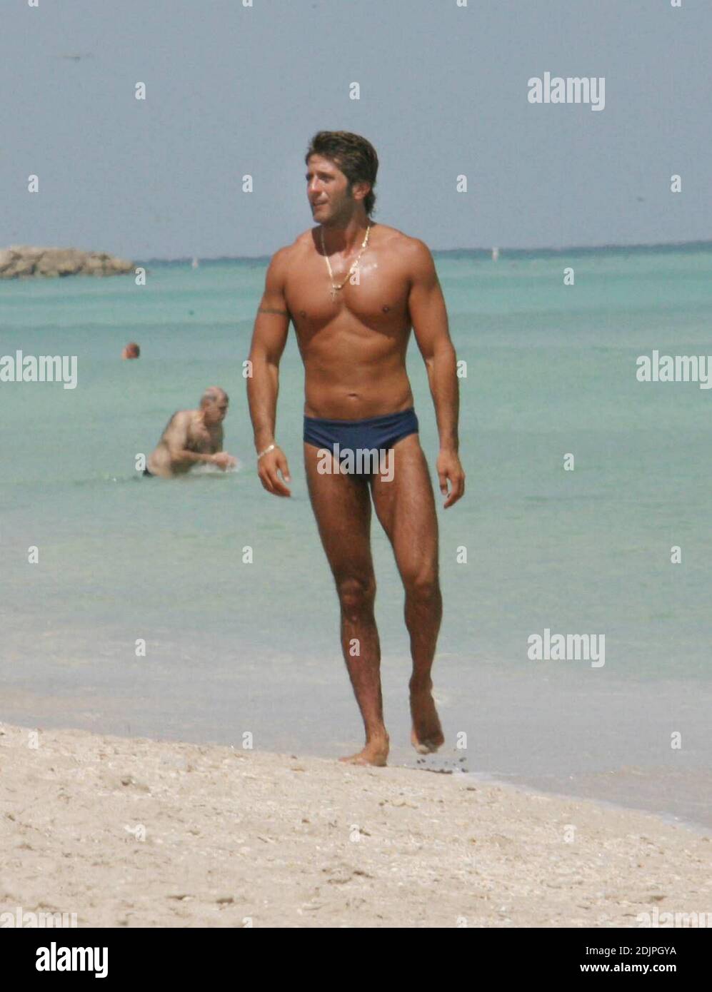 Mexican actor Bobby Larios relaxes in the sun on Miami Beach following his divorce from Niurka Marcos. 09/20/06 Stock Photo