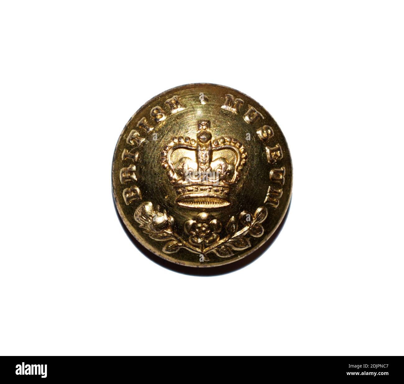 A brass staff uniform button from the British Museum with the Queens crown c. 1980s. Stock Photo