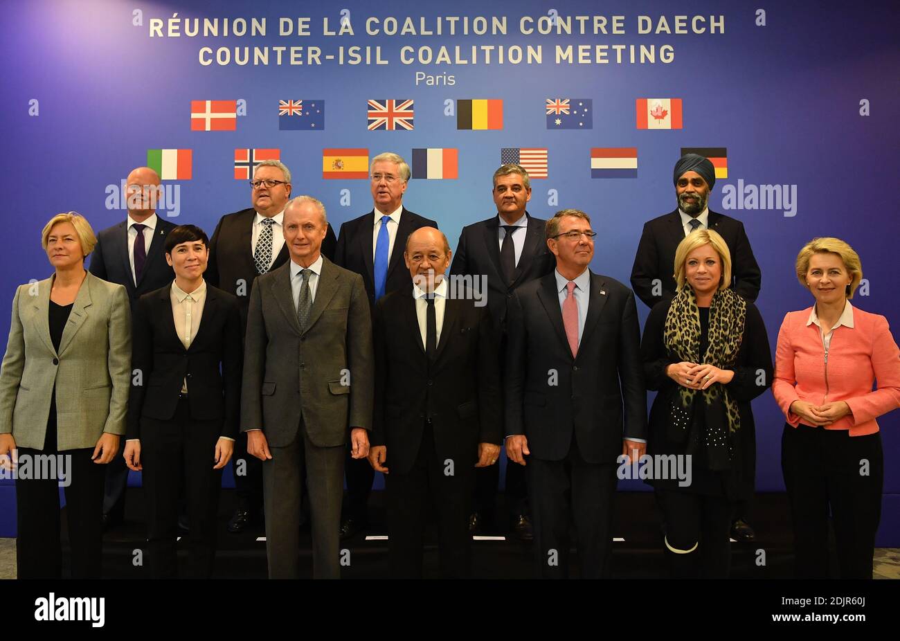French Minister of Defence Jean-Yves Le Drian poses for a family photo with the Defence Ministers of the Coalition in Iraq and Syria, Ashton Carter (USA), Michael Fallon (UK), Jeanine Hennis-Plasschaert (Netherlands), Marise Payne (Australia), Roberta Pinotti (Italy), Ursula Von Der Leyen (Germany), Pedro Morenes (Spain), Peter Christensen (Denmark), Ine Marie Eriksen Soreide (Norway), Steven Vandeput (Belgium), Gerry Brownlee (New Zealand) and Harjit Sajjan (Canada), during the opening of a Counter-ISIL Coalition Meeting held at the French Ministry of Defence's headquarters in Paris, France o Stock Photo