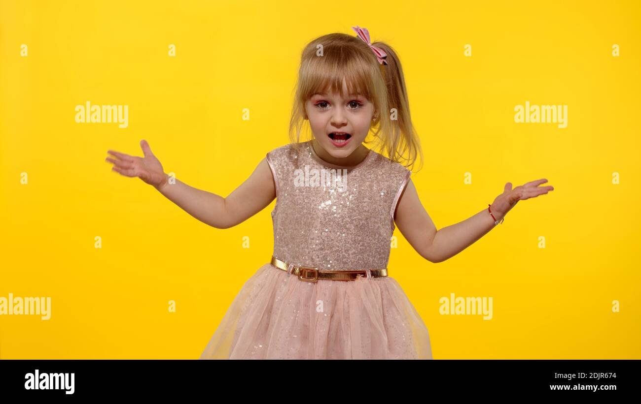 Kid scolding with indignant expression, blaming in defeat. Yellow ...