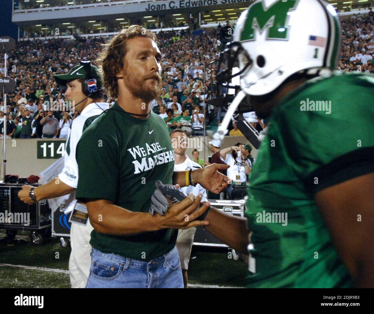 Matthew McConaughey encourages Marshall University wide receiver Marcus  Fitzgerald prior to Wednesday's game as he was in town to promote his new  Warner Brothers film "We Are Marshall" Wednesday, 10/4/06 as the