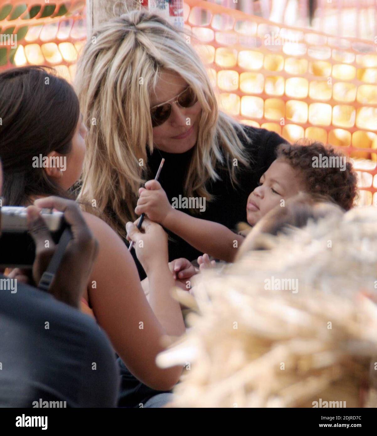 Heidi Klum and Seal take their growing brood to the Pumpkin Patch in West Hollywood, Ca. The children played with skeletons and ran around in a  bouncy pumpkin.  They even took a ride on ponies but the pair refused to get their faces painted. The family spent two hours in the Halloween hotspot before selecting a few pumpkins and heading home. 10/14/06 Stock Photo