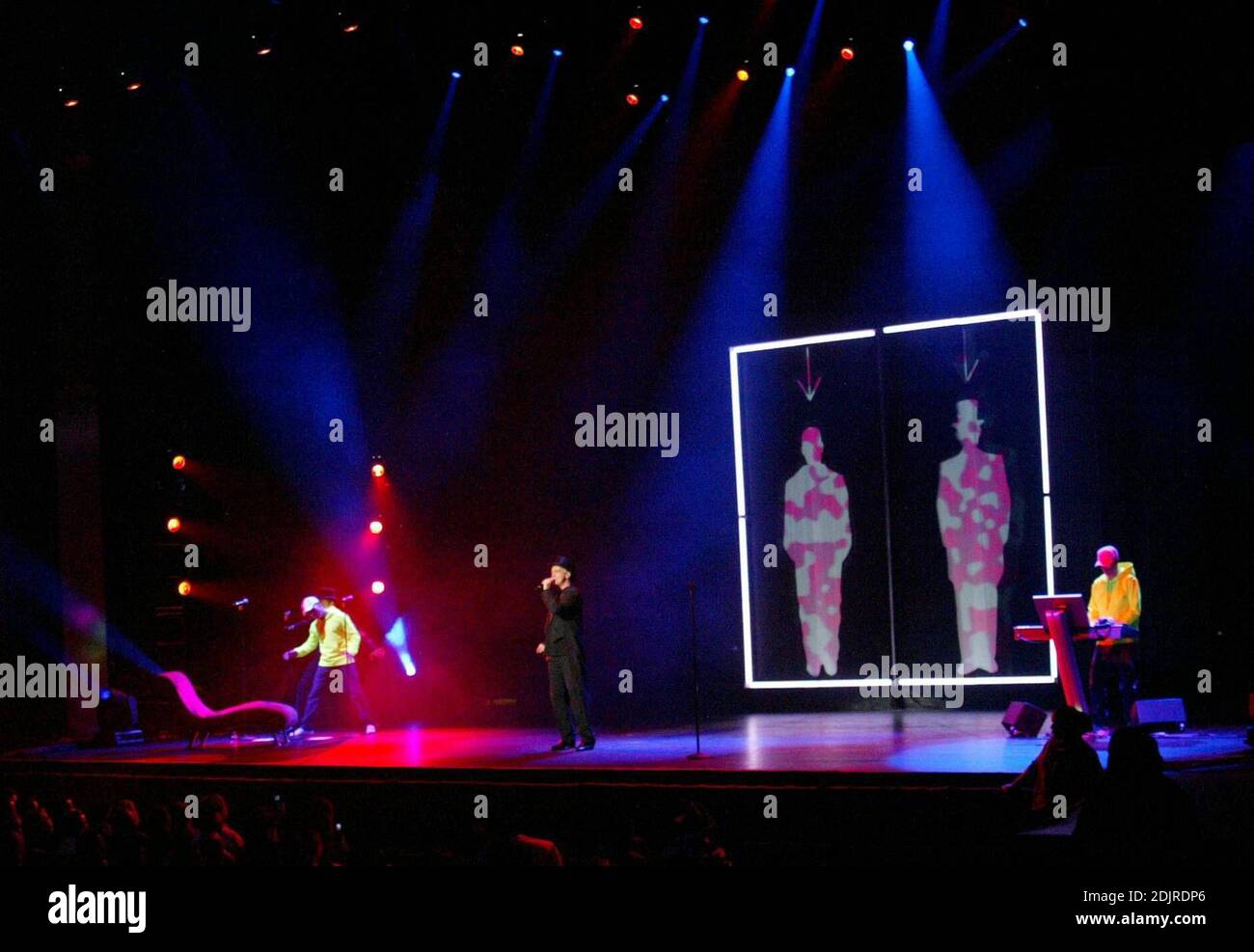 The pet shop boys wearing top hats and tails perform at the jackie