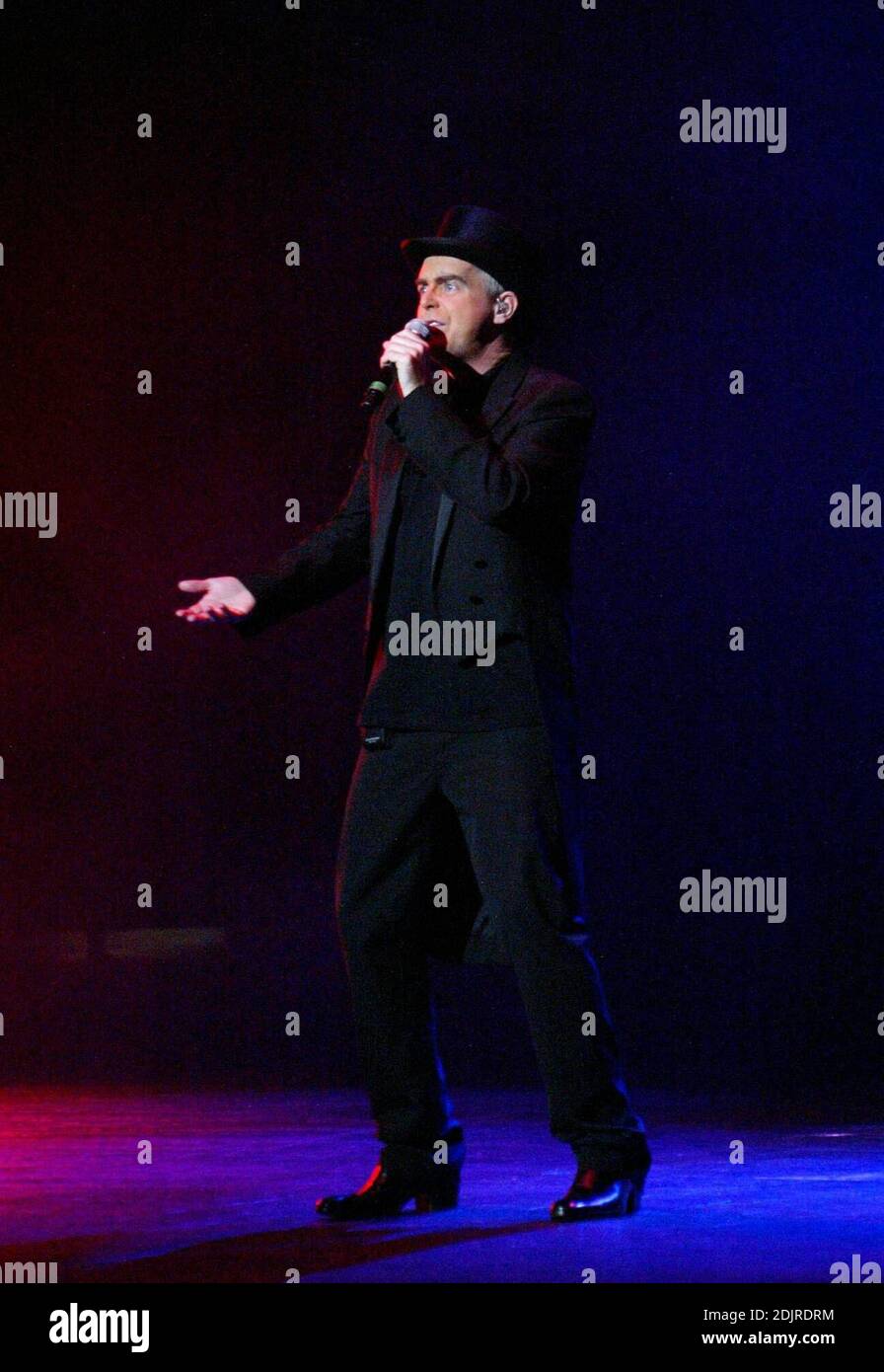 The pet shop boys wearing top hats and tails perform at the jackie