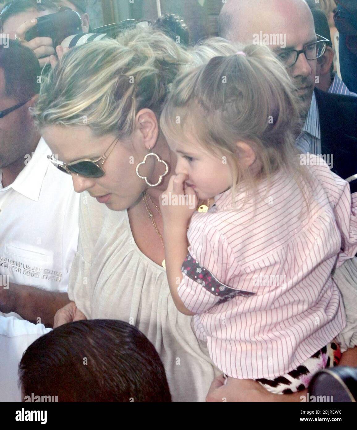 Heidi Klum Takes Her Kids To The Ivy In Los Angeles Ca Heavily Pregnant Klum Sported A Pirate Style Outfit And A Gold Necklace With Charms Showing The Photos And Names Of