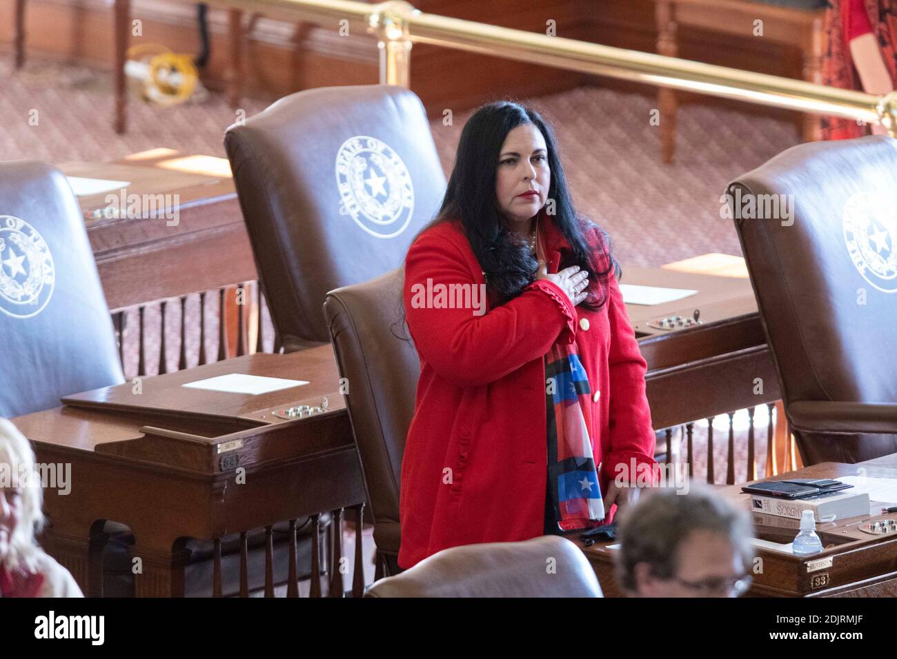 Austin, Texas, USA. 14th Dec, 2020. Naomi Narvaiz of San Marcos recites a pledge before Texas presidential electors cast ballots for President Donald Trump at the Electoral College vote Monday afternoon in the House Chamber. As expected, all 38 Texas votes went to the president and vice president. Credit: Bob Daemmrich/Alamy Live News Stock Photo