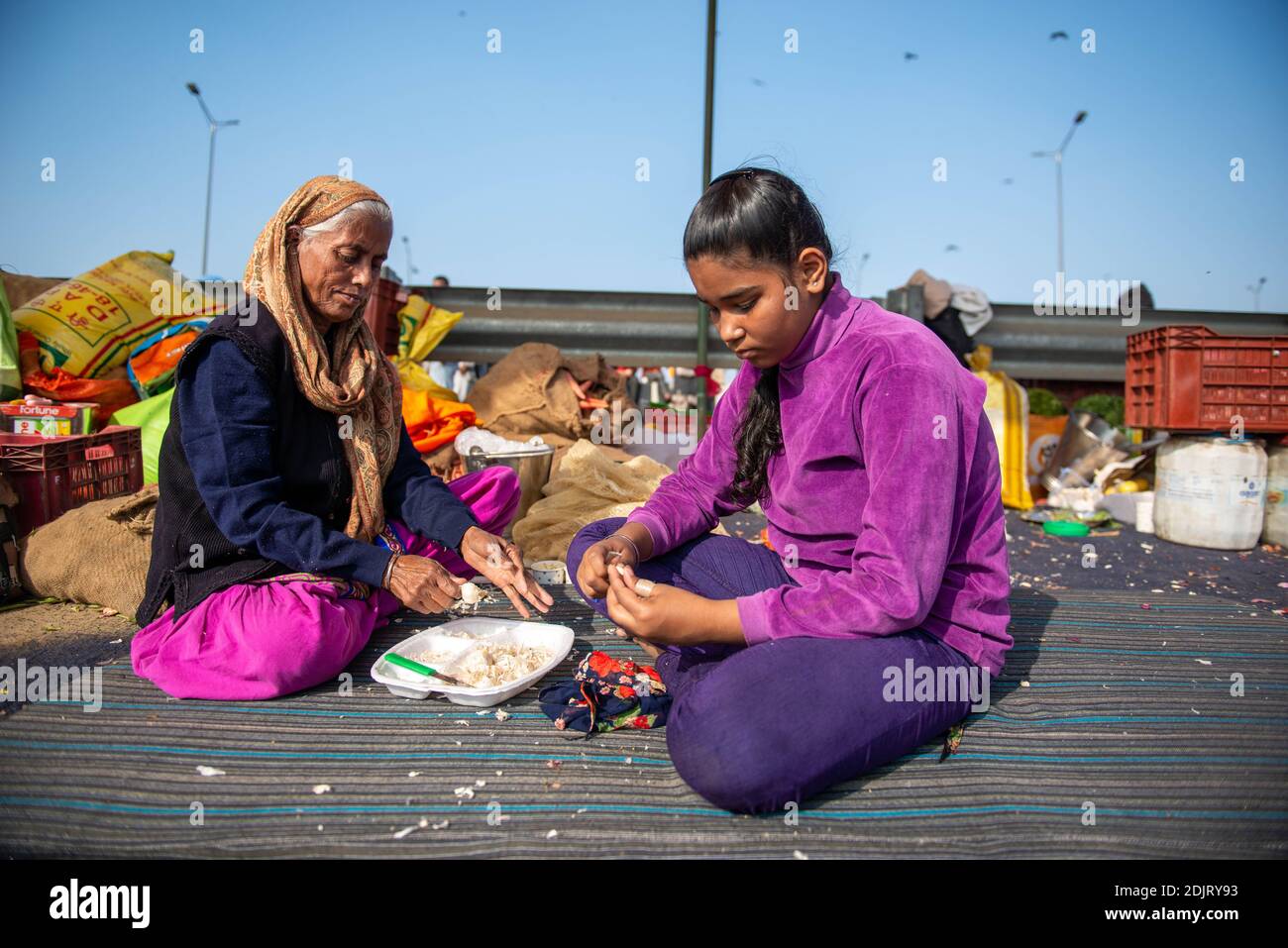 Sukhvinder Kaur A 13 Year Old Girl Helps In Kitchen To Prepare Meals During The Demonstration Students Of Different Age Groups Have Been Helping Farmers In Serving Langar Food Community Kitchen Preparing Meals