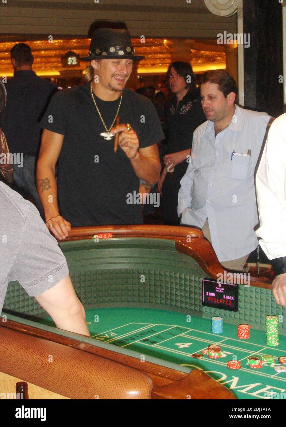 Kid Rock must be winning judging by the grin on his face as he hits the craps tables in Las Vegas, Nv. His wife Pamela Anderson, was no where to be seen after she reportedly suffered a miscarriage last week. 11/17/06 Stock Photo