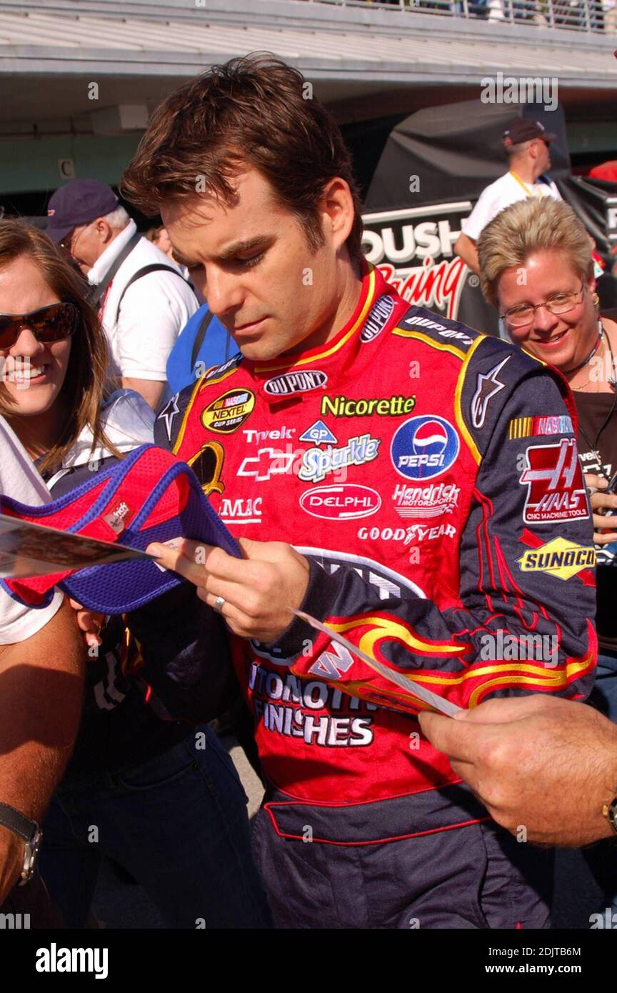 Race car driver Jeff Gordon and wife at the Ford 400 NASCAR NEXTEL Cup
