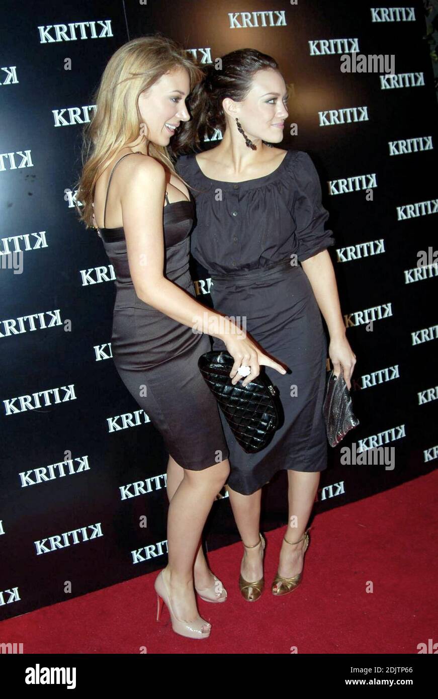 Haylie Duff and Hilary Duff attend publicist to the stars Jonathan Cheban's clothing line launch KRITIK at Casa Casuarina, Miami Beach 12/30/06 Stock Photo