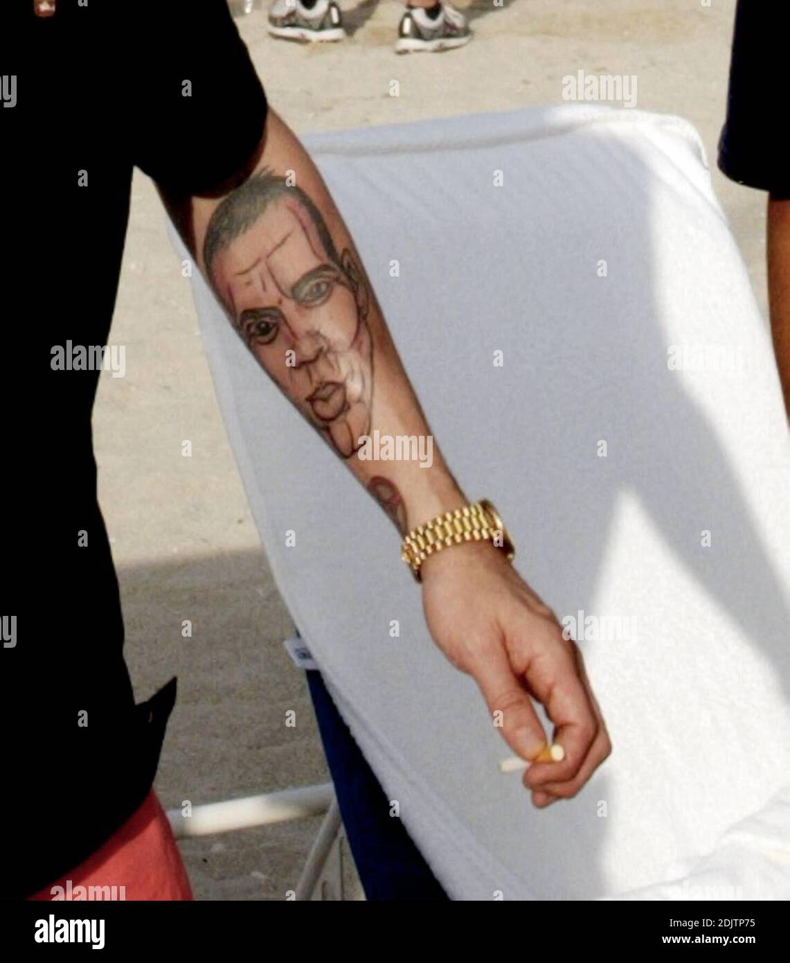 Steve-O shows of his tattoos on the beach in Miami, Fl. 12/30/06 Stock Photo