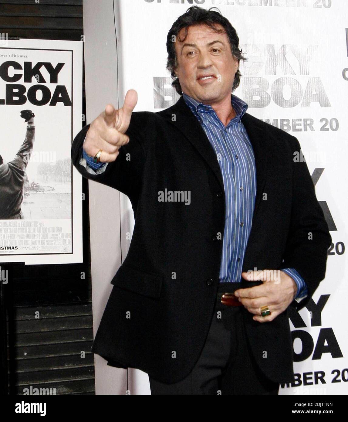 Actor Sylvester Stallone points to fans before the premiere of the 'Rocky Balboa' in Philadelphia, Pennsylvania, December 18, 2006.  Photo / John Taggart Stock Photo