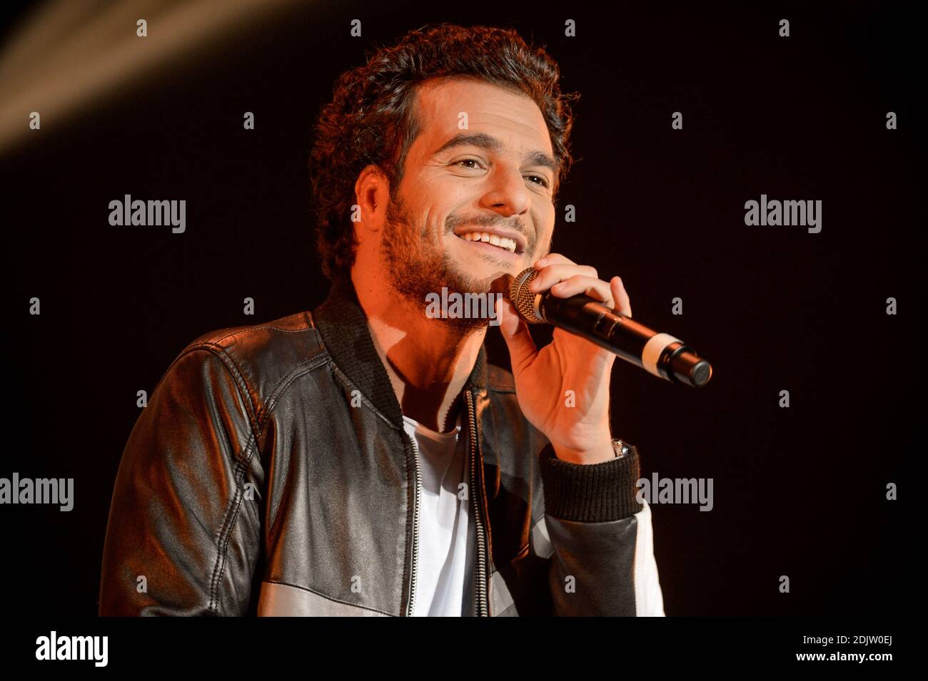 Amir performs on stage during the Scoop Live concert at Amphitheatre