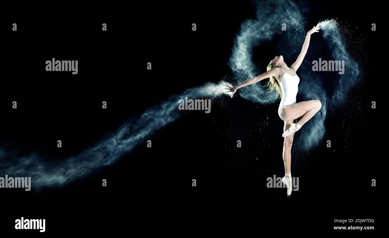 Ballet Dancer Dancing Against Black Background Stock Photo - Alamy