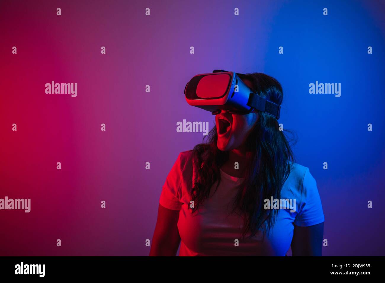 A portrait of a brown girl plus size model with a virtual reality ...