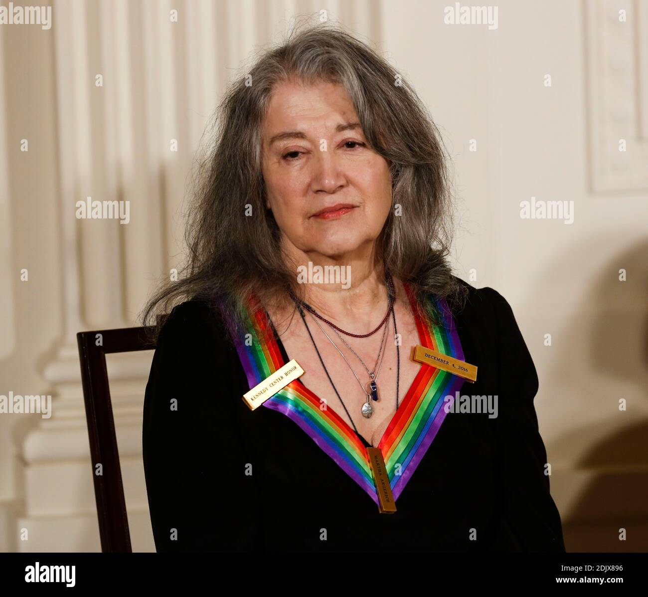 Pianist Martha Argerich, a 2016 Kennedy Center Honoree, listens to US President Barack Obama, in the East Room of the White House, December 4, 2016, Washington, DC. (Pool/Aude Guerrucci) Stock Photo