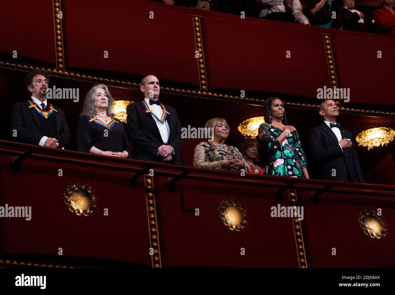 (L-R) 2016 Kennedy Center Honorees actor Al Pacino, pianist Martha Argerich, singer James Taylor, singer Mavis Staples, First Lady Michelle Obama and Us President Barack Obama listen to the National Anthem at the Kennedy Center, December 4, 2016, Washington, DC. (Pool/Aude Guerrucci) Stock Photo