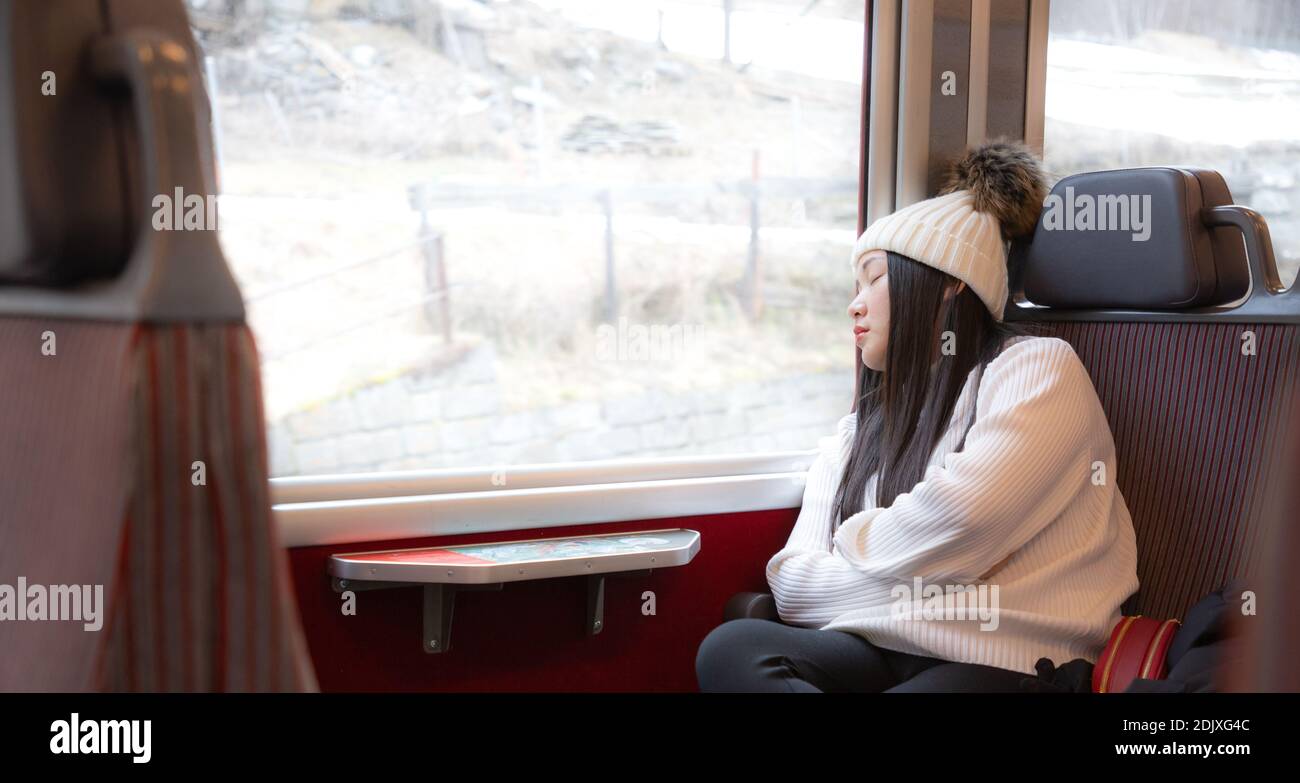 A Woman Sleeping On A Train High Resolution Stock Photography and ...