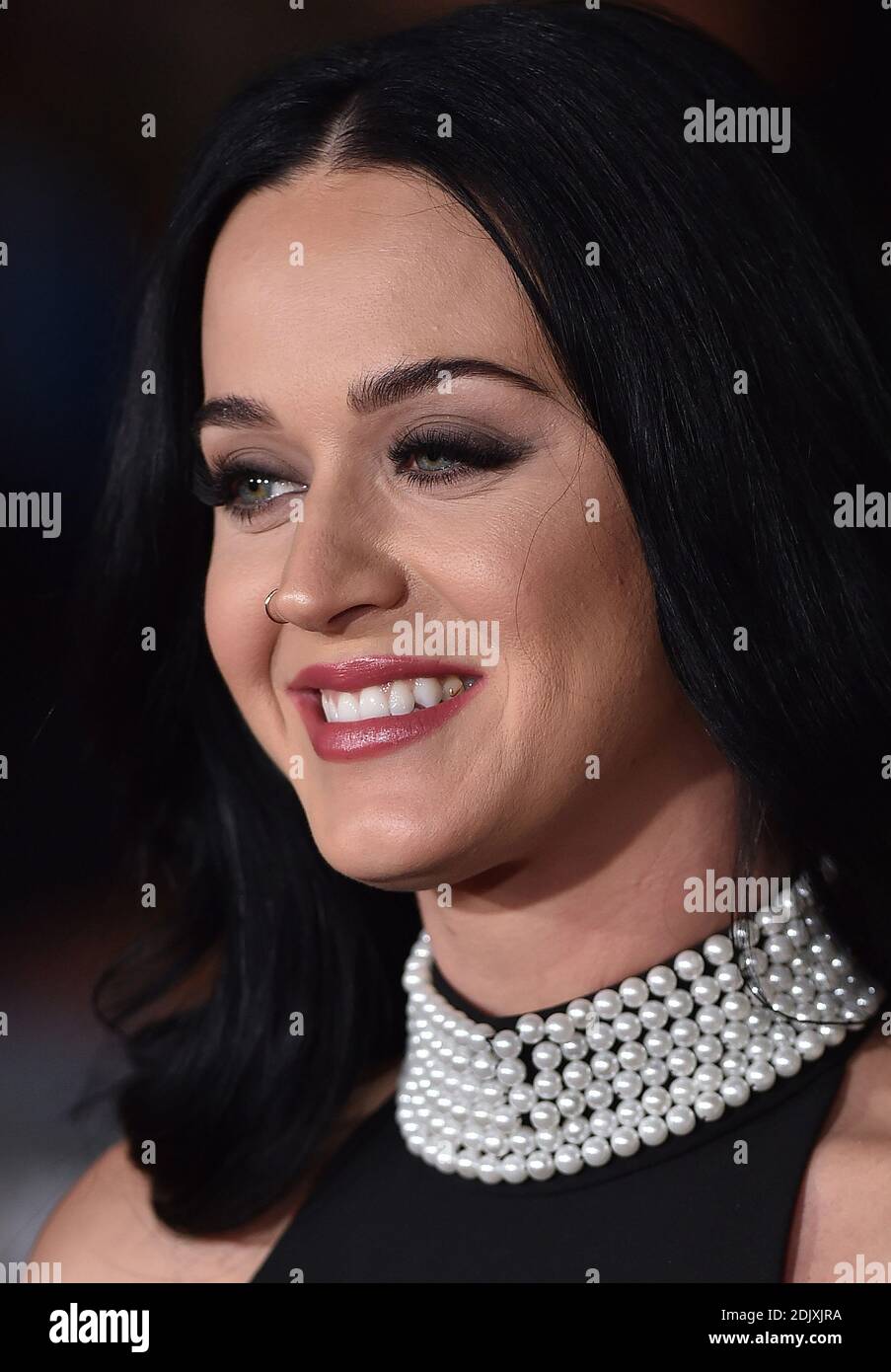 Katy Perry still wearing her Nike gold tooth jewelry attends the premiere  of Paramount Pictures' 'Office Christmas Party' at Regency Village Theatre  on December 7, 2016 in Los Angeles, California. Photo by