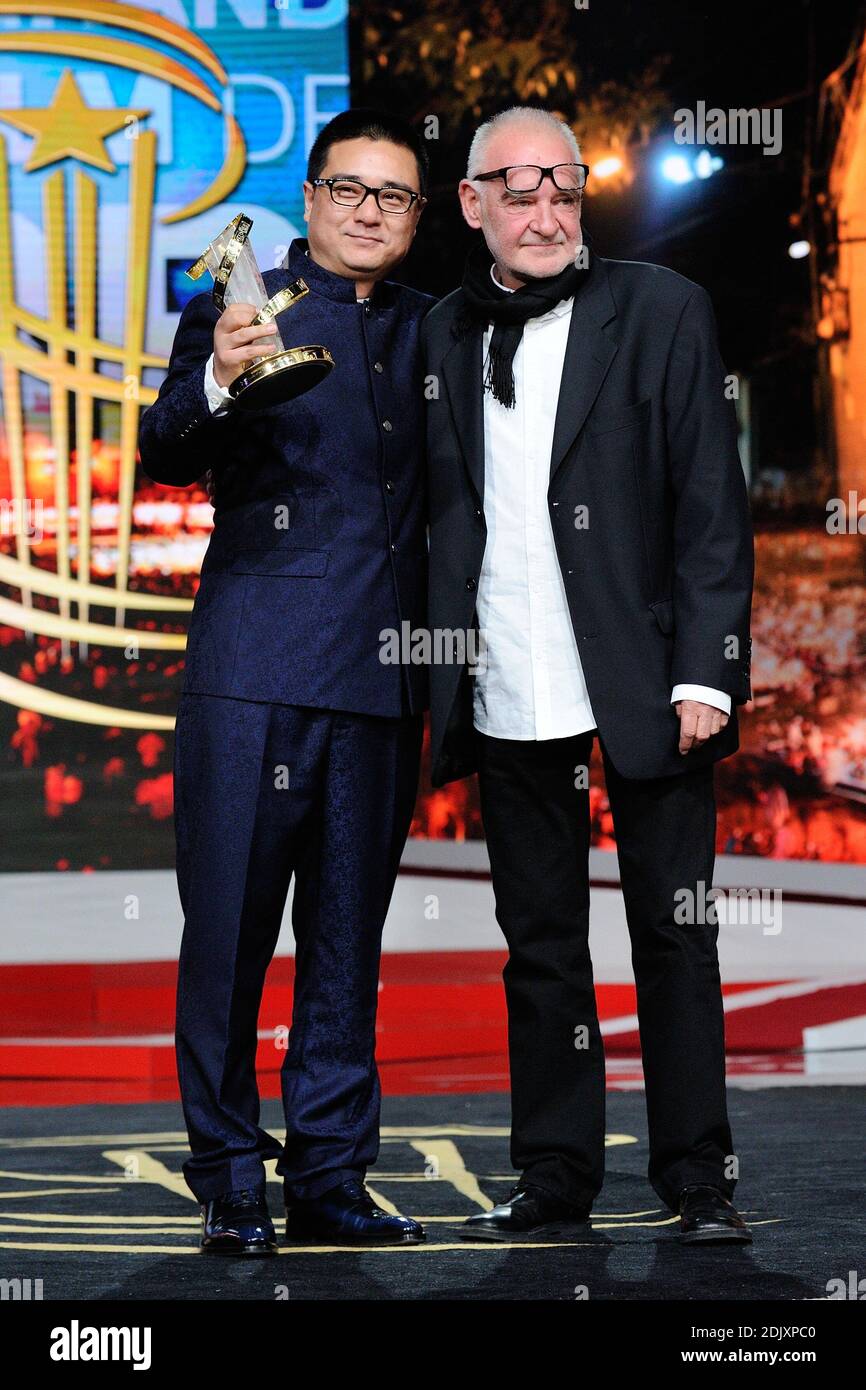 Chinese director Zang Qi Wu receives the Best Film Award from Hungarian director Bela Tarr during the Closing Ceremony of the 16th Marrakech International Film Festival in Marrakech, Morocco on December 10, 2016. Photo by Aurore Marechal/ABACAPRESS.COM Stock Photo