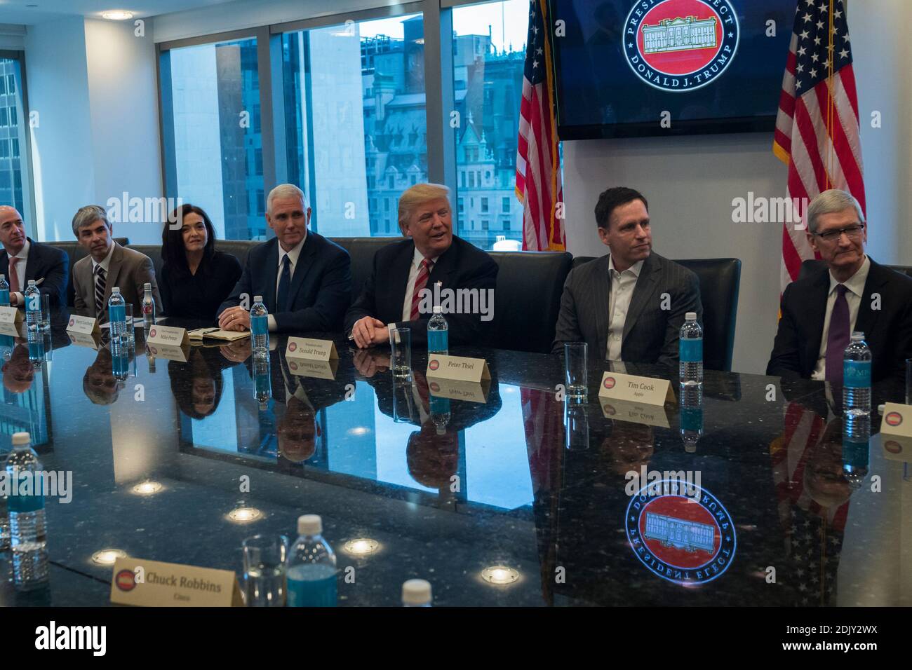 President-elect Donald Trump, Vice President-elect Mike Pence, cabinet nominees and technology company chiefs are seen at a meeting in the Trump Organization conference room at Trump Tower in New York, NY, USA on December 14, 2016. Credit: Albin Lohr-Jones / Pool via CNP Stock Photo