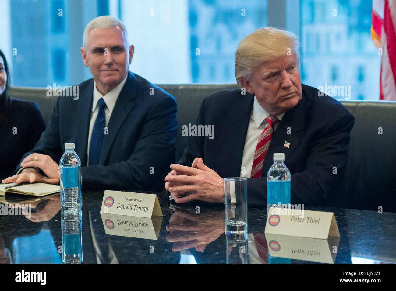 President-elect Donald Trump (R) and Vive President-elect Mike Pence (L) are seen at a meeting of technology leaders in the Trump Organization conference room at Trump Tower in New York, NY, USA on December 14, 2016. Credit: Albin Lohr-Jones / Pool via CNP Stock Photo