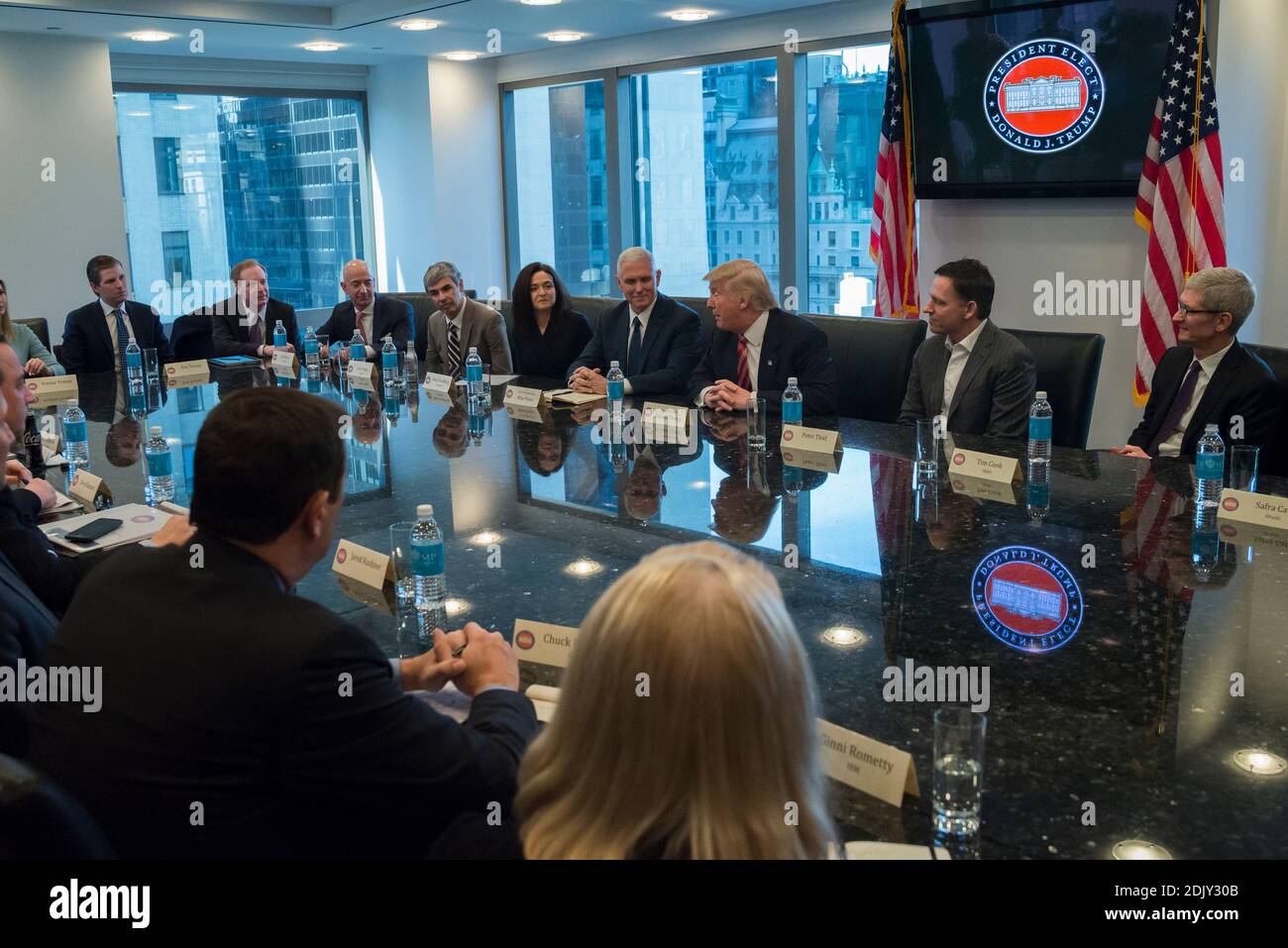 President-elect Donald Trump, Vice President-elect Mike Pence, cabinet nominees and technology company chiefs are seen at a meeting in the Trump Organization conference room at Trump Tower in New York, NY, USA on December 14, 2016. Credit: Albin Lohr-Jones / Pool via CNP Stock Photo