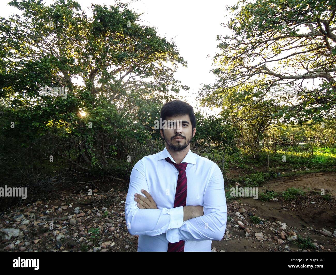 South indian man standing arms hi-res stock photography and images - Alamy