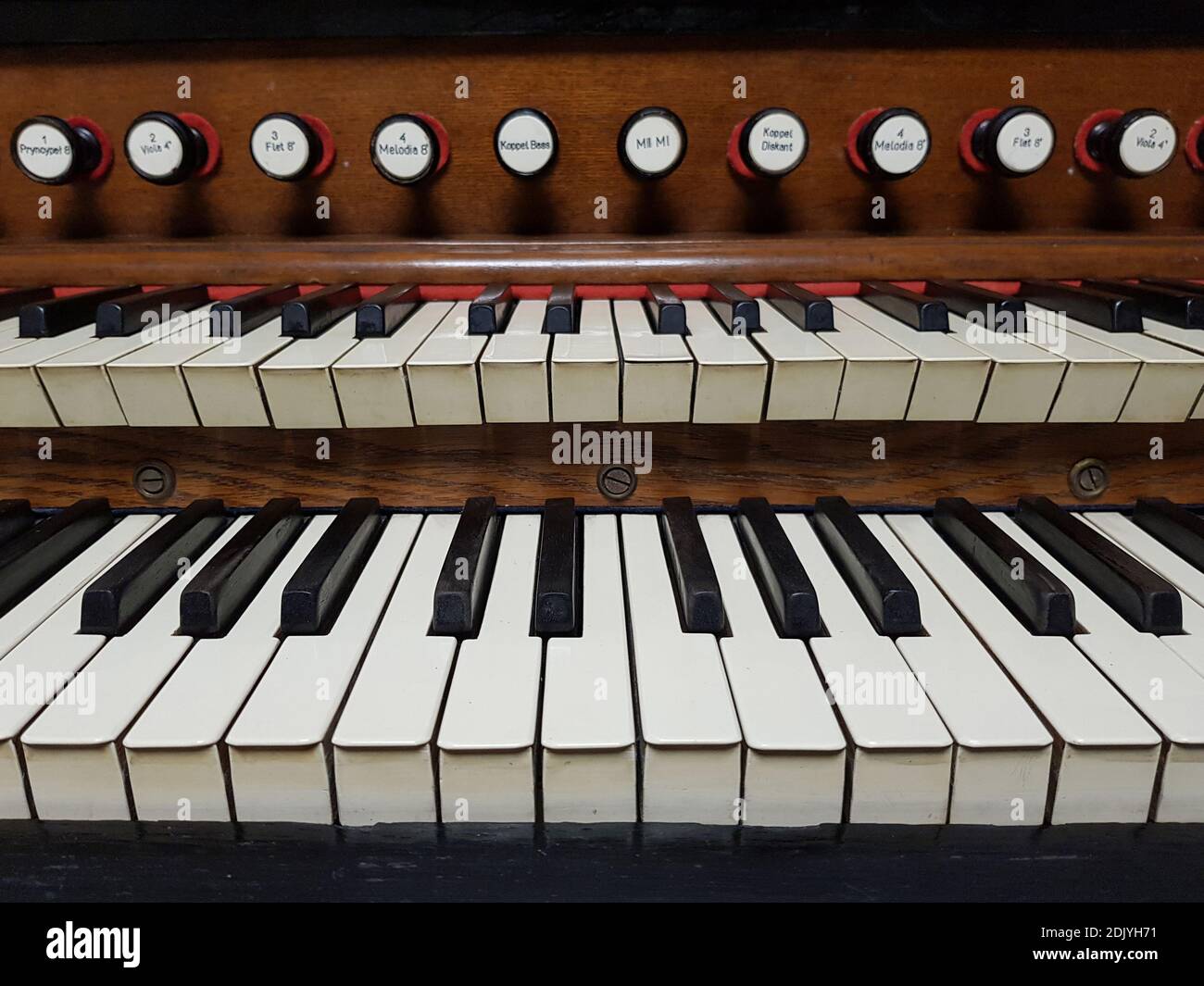Old vintage wooden harmonium / pipe organ keyboard detailed closeup