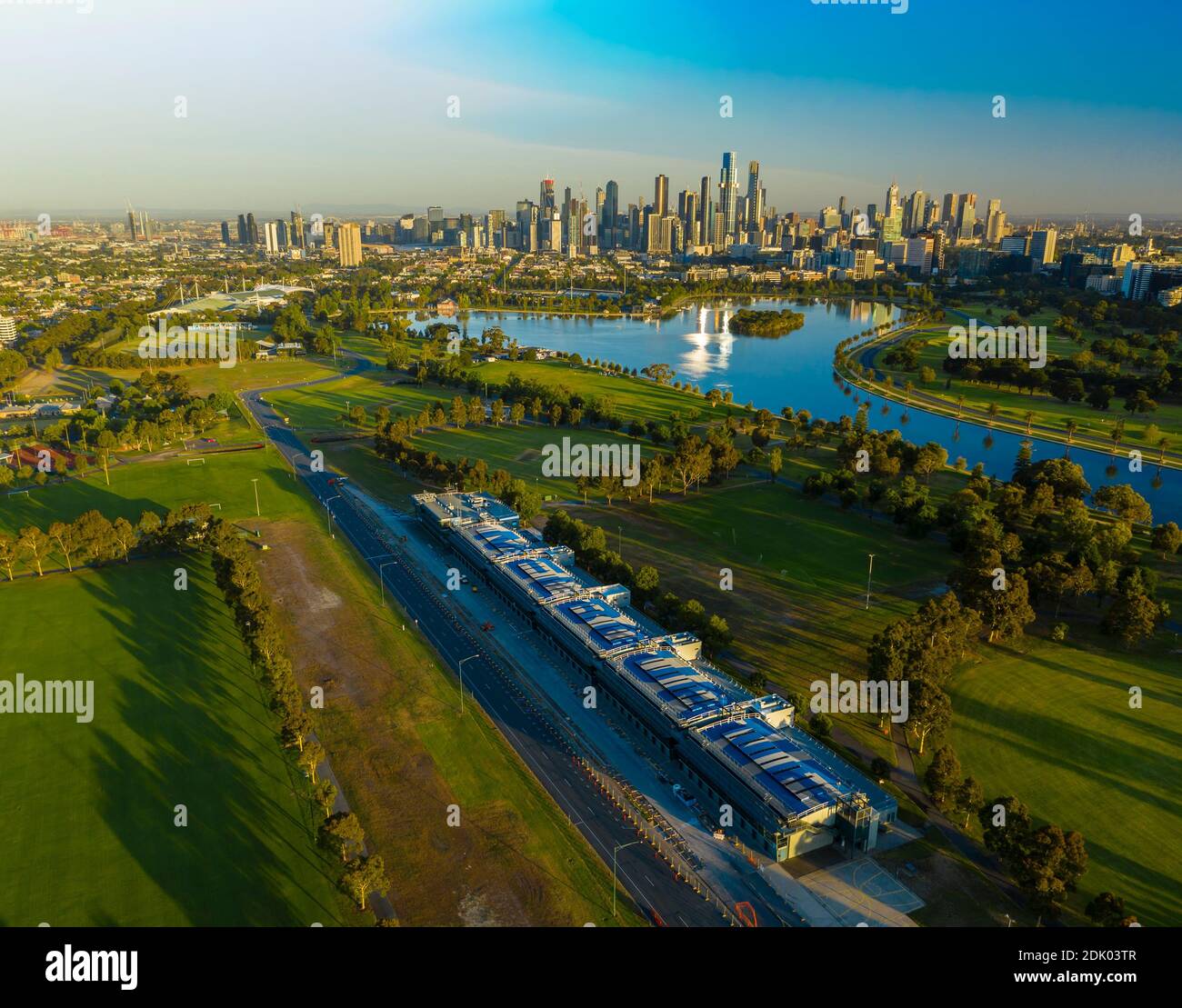 Aerial photo of beautiful park and Melbourne CBD at sunrise Stock Photo