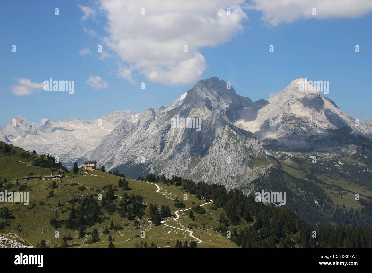View from Schachentor to Schachen with Schachenschloss, in the background Zugspitze and Alpspitze Stock Photo