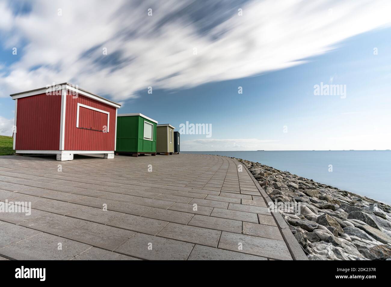 Bathing stalls, beach huts, long exposure, Dagebüll, North Sea, Schleswig-Holstein, Germany, Europe Stock Photo