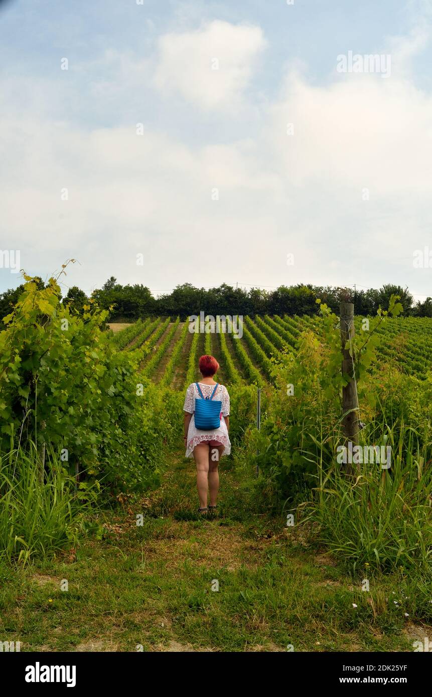 Full Length Of Woman Standing In Farm Against Sky Stock Photo
