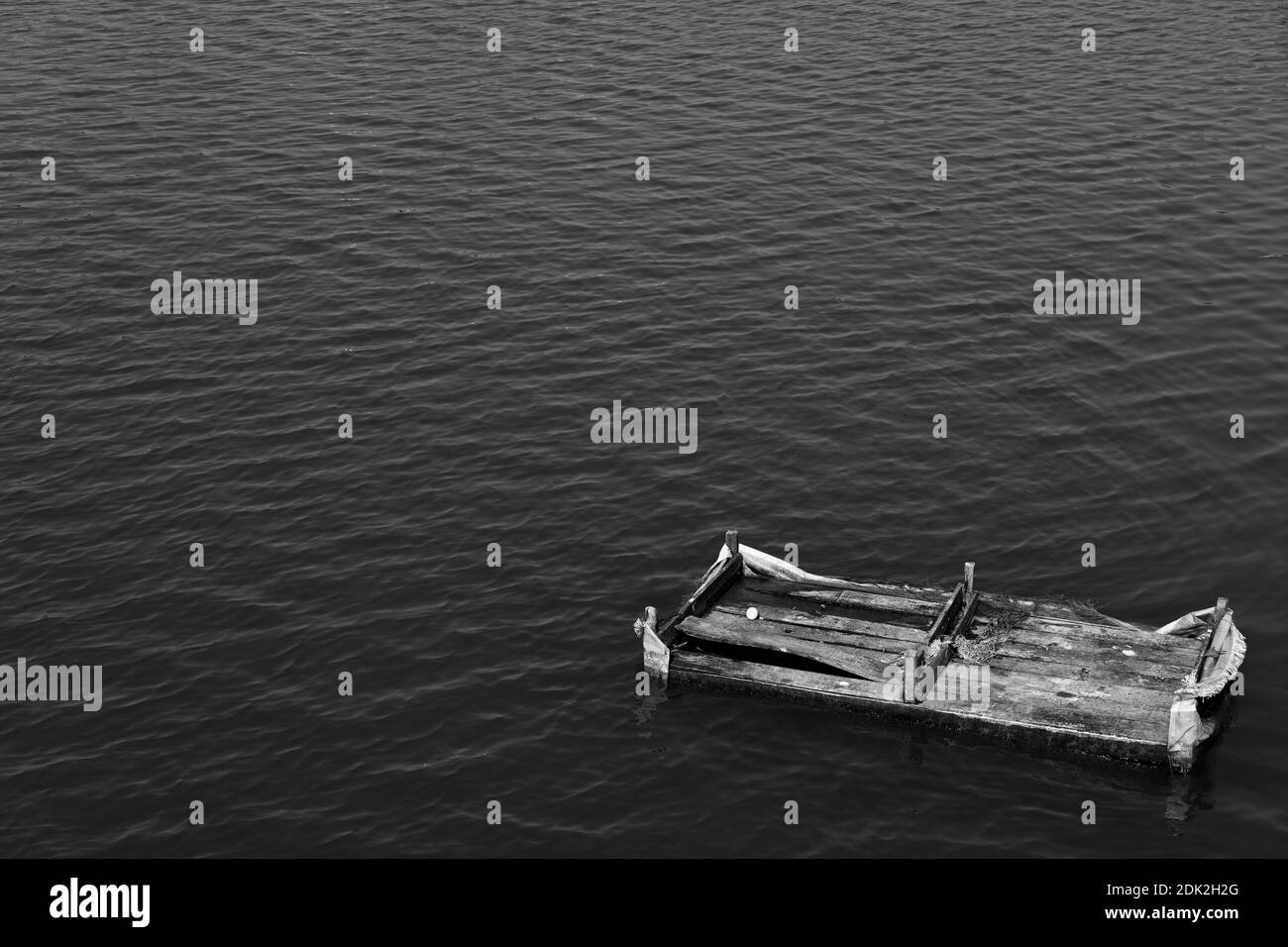 Damaged Log Raft Wooden raft Black and White Stock Photos & Images - Alamy