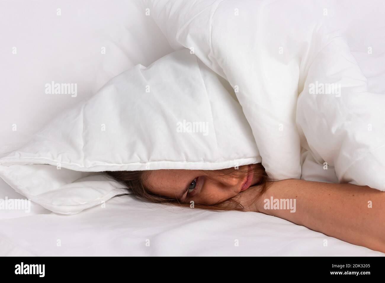 Sleeping under blanket sale