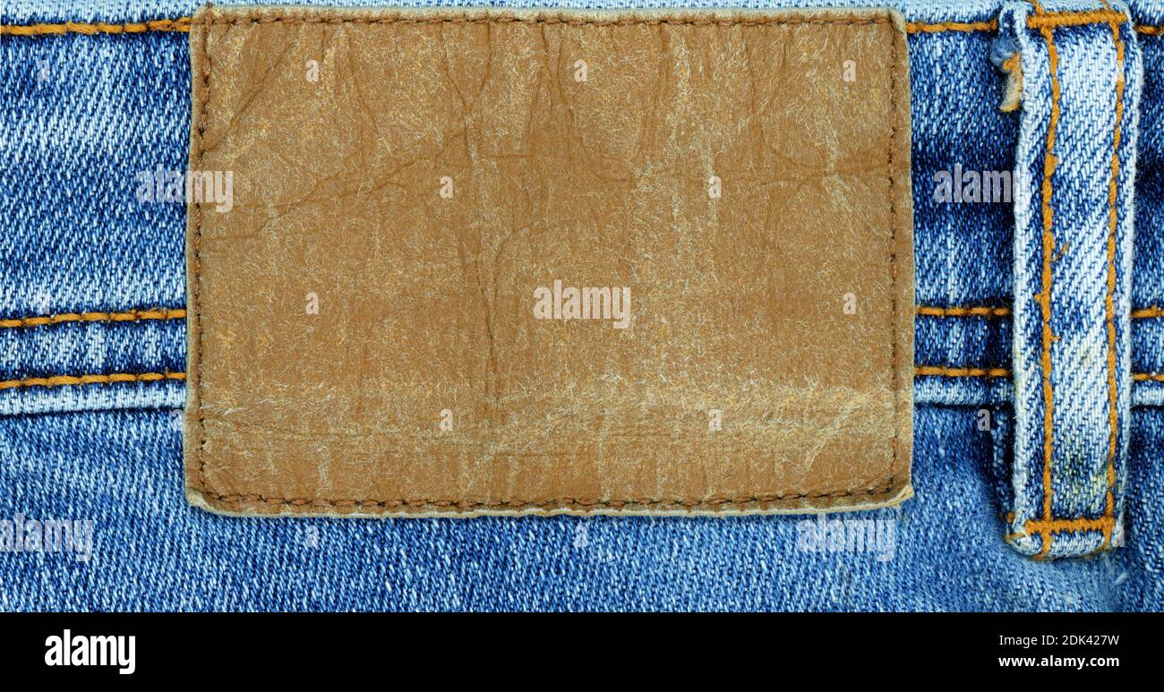 Leather jeans label sewed on jeans Stock Photo