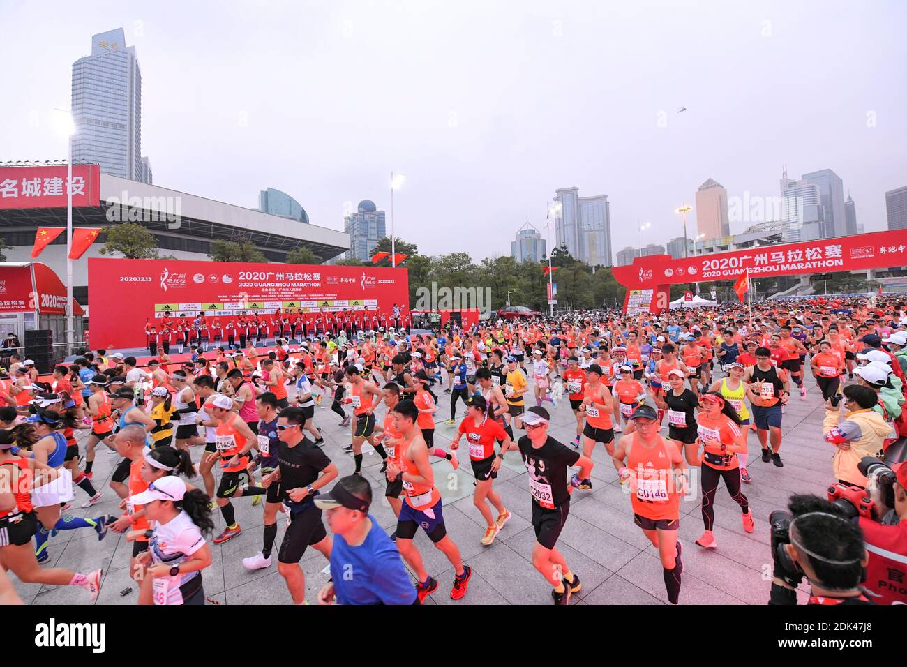 Runners run in the 2020 Guangzhou Marathon in Guangzhou, south China's Guangdong province, 13 December 2020. The event is held from 7:30 to 13:45. Som Stock Photo