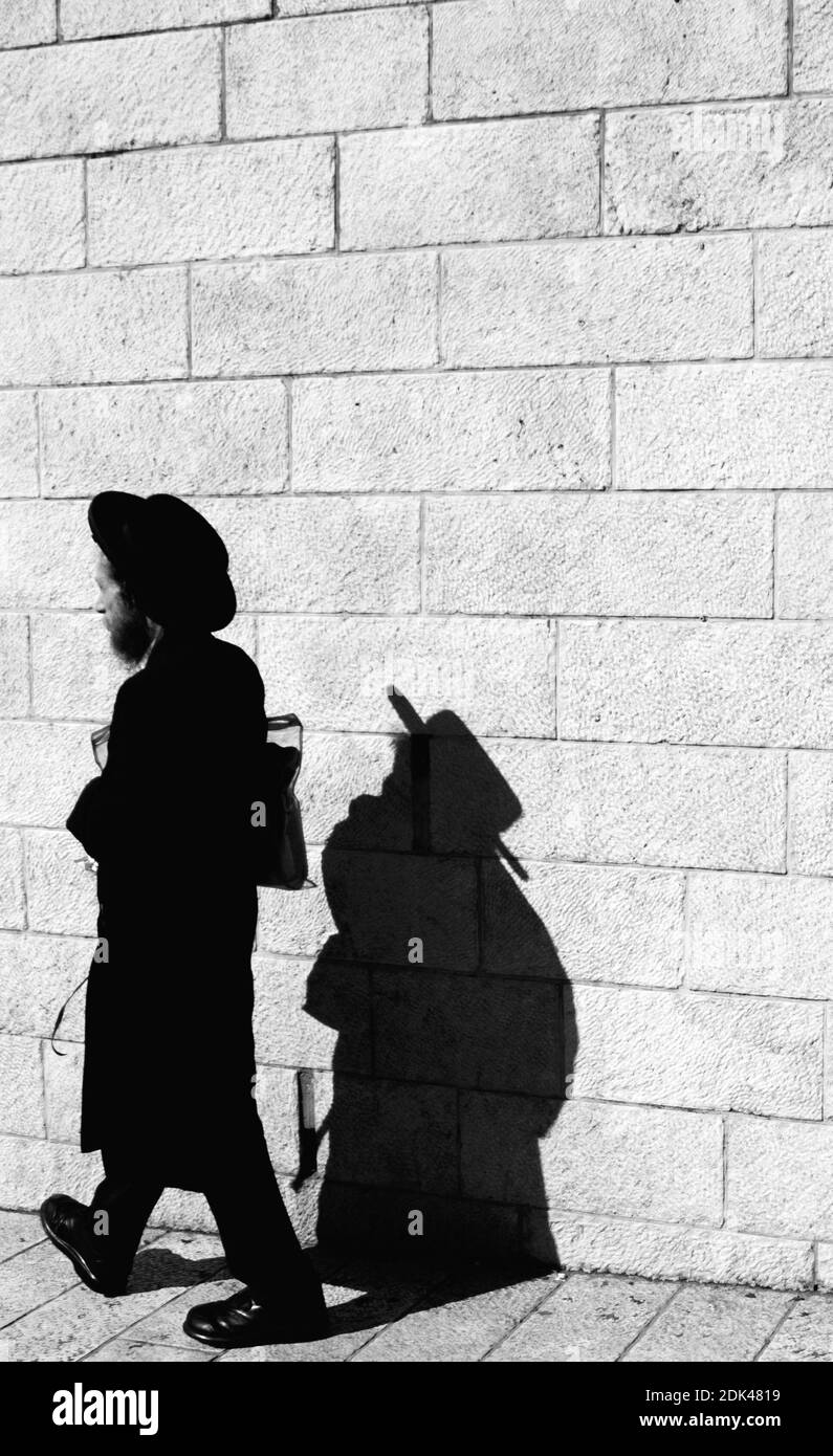 Man Walking Side View Sunlight Black and White Stock Photos & Images ...