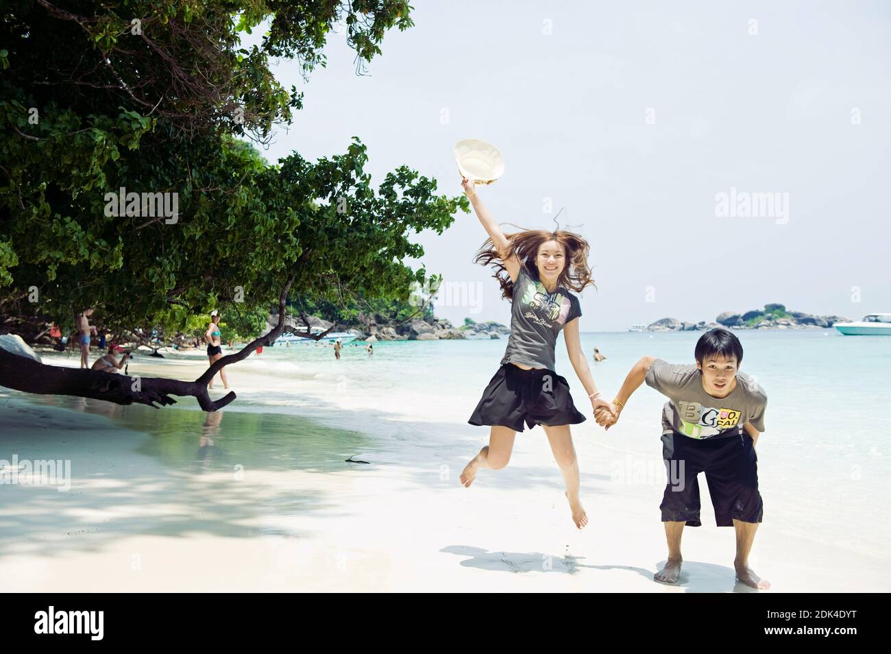Asian family at the beach hi-res stock photography and images - Alamy