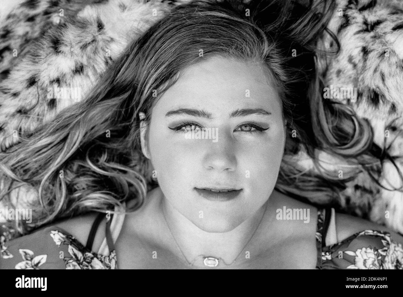Teenage girl lying on bed Black and White Stock Photos & Images Alamy